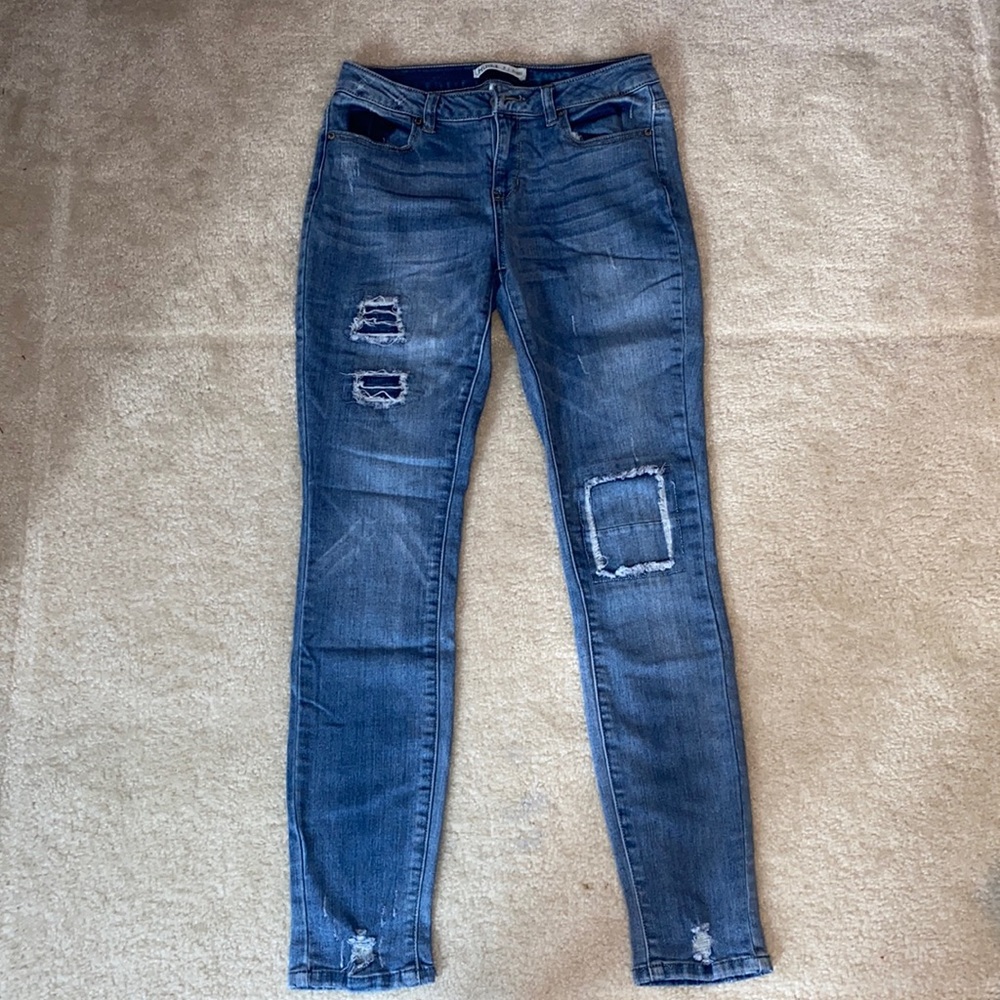 Mudd skinny, decent stretch jeans with distressed patchwork.